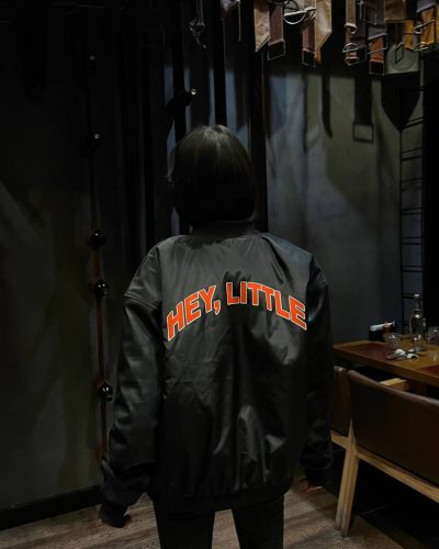 Бомбер з плащівки та вставками з еко-шкіри